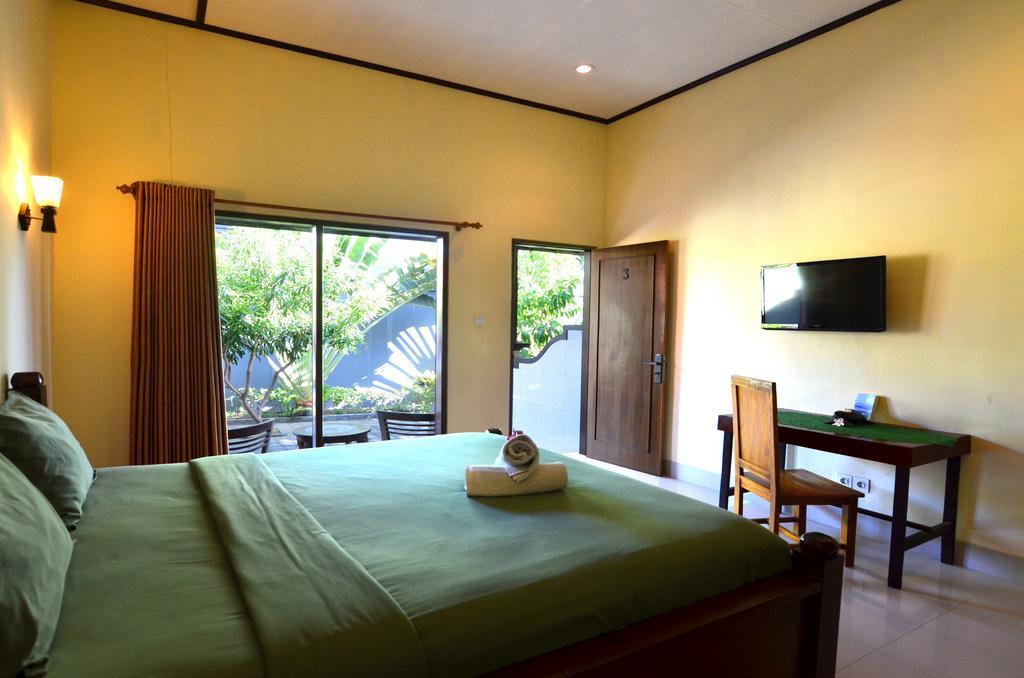 Arik Homestay Canggu Esterno foto