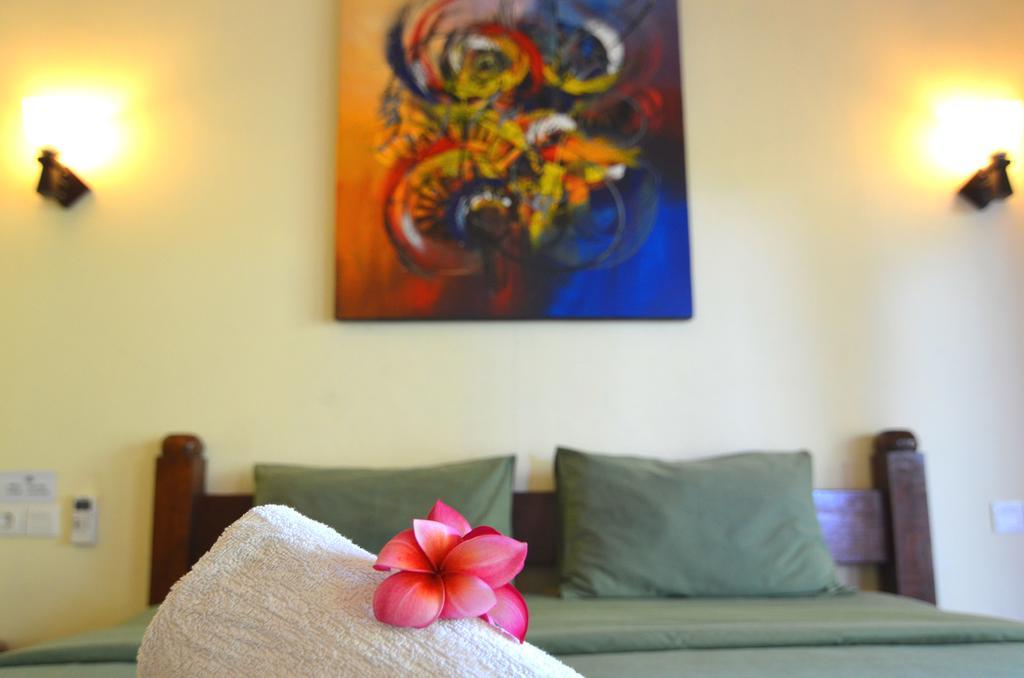 Arik Homestay Canggu Esterno foto